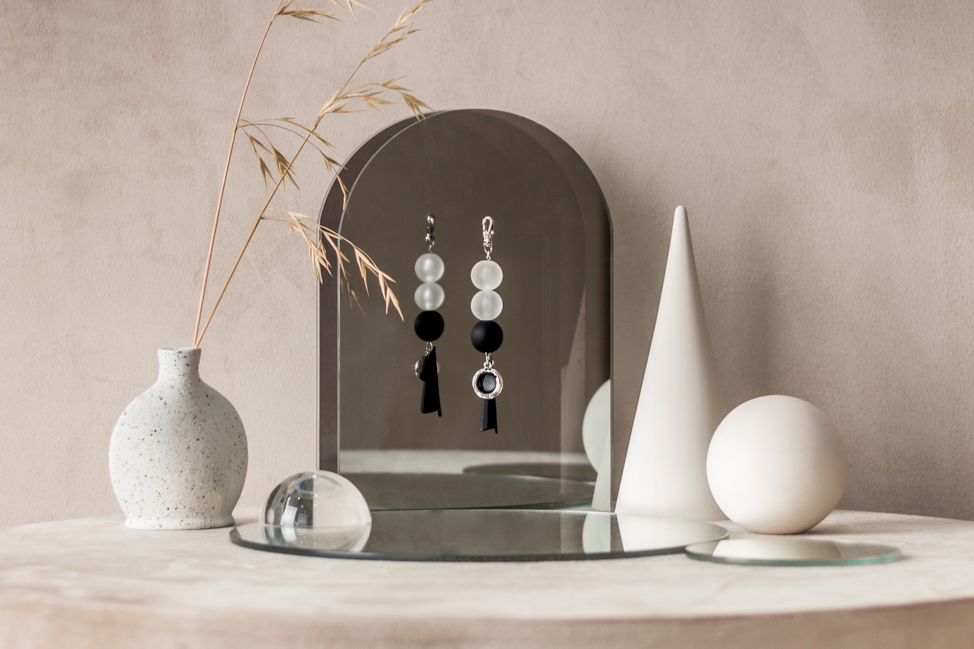 <right> <a style="padding-right:50px; color:# 000000;"> <span style="font-size:15px; line-height:160%;"> <br><br><b> Something ring : 3 Circles </b> </span> </a> <br><br><br> <a style="padding-right:50px; color:# 000000;"> <span style="font-size:12px; line-height:160%;"> '3 Circles' is key to the repetition of three circle beads that have the same or different characteristics of texture, color, size and shape. <br> The ornaments at lower part in a vertical form and various shapes matched the main three beads, is balanced with combination perfectly. <br> The aesthetic elements was applied differently to each of the five colors, which were chosen according to the unique concept each color has. <br><br> <i>5 colors, Acrylic beads, Metal ring.</i> </span> </a> </right>