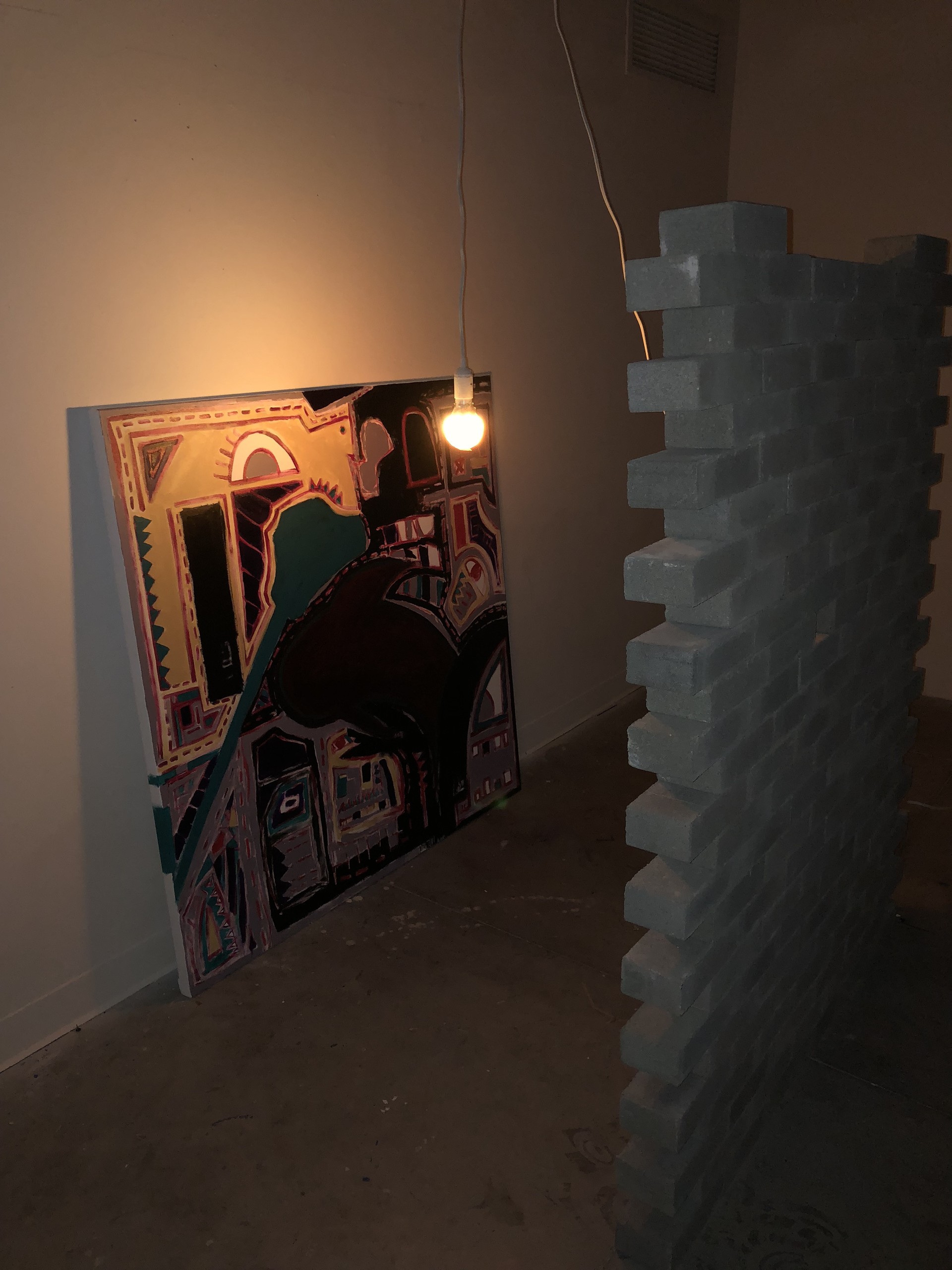 ”Misunderstand” / 2017 / 94.6inx45.8inx47.6in / concrete bricks, acrylic on canvas, lightbulb