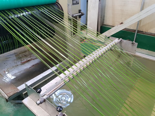 Yarn extrusion from raw material