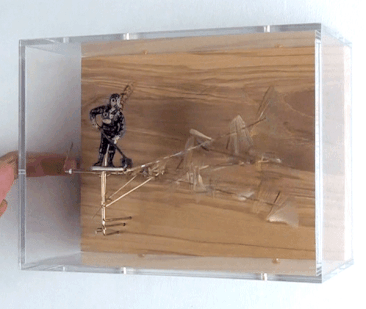Jane Edden, Dust, 2018, Mixed media, Lead man, insect wings, brass mechanism framed in Perspex box, 15 x 20 x 10 cm, JE 006