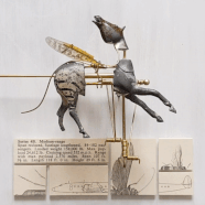 Jane Edden, Fuselage Lengthened, 2018, Mixed media with brass mechanism in Perspex box, 15 x 15 x 10 cm, JE 007