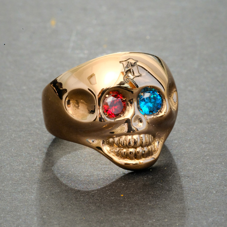 Gold skull ring on sale with ruby eyes