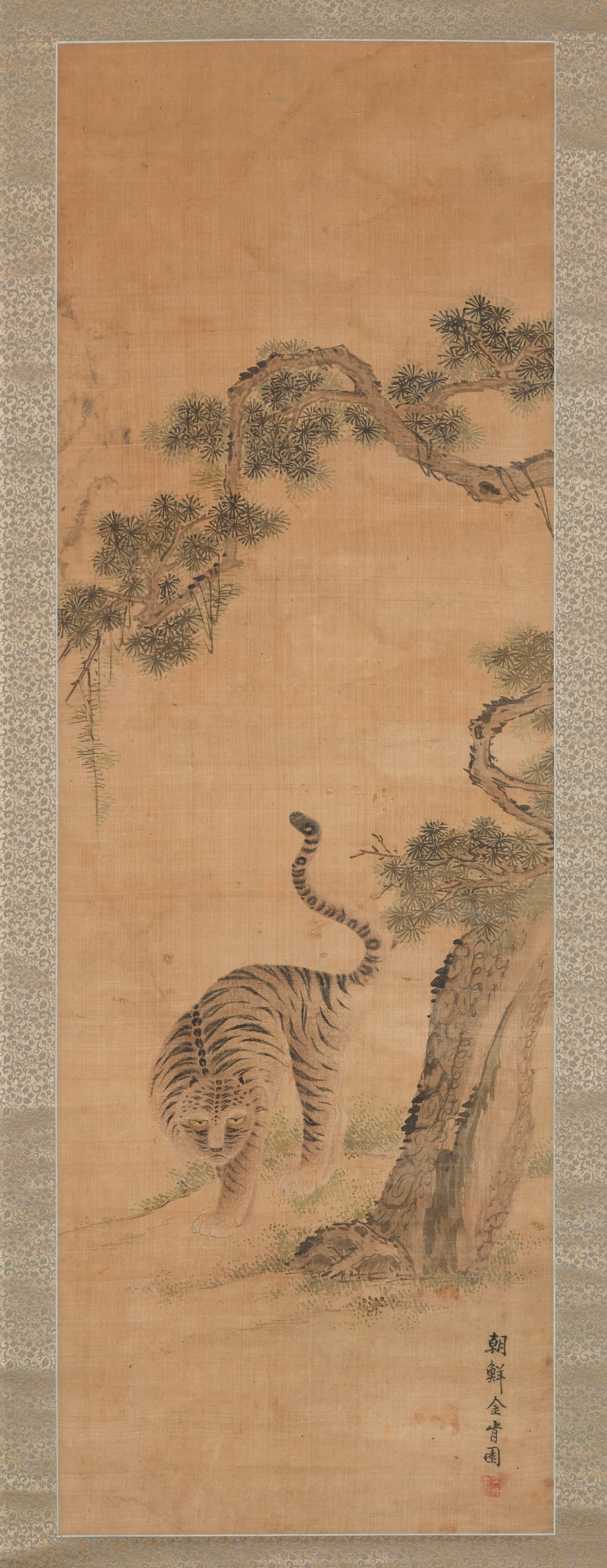<i>Painting of a Brave Tiger under a Pine Tree</i> (松下猛虎圖), Kim Yanggi, Joseon dynasty, 19th century, ink and color on silk, 121.4×40.5cm. National Museum of Korea. ⓒNational Museum of Korea