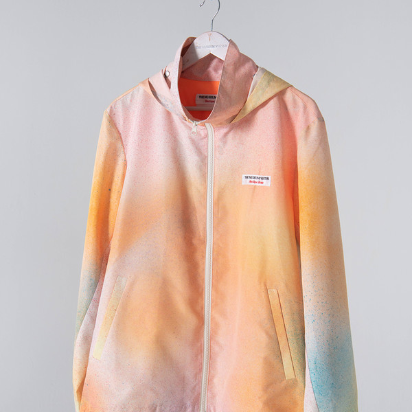 【THE MUSEUM VISITOR】SPRAYED PRINTED WINDBREAKER SPRAYED PRINTED WINDBREAKER (ORANGE) : THE MUSEUM VISITOR