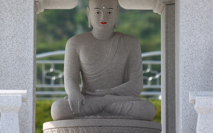 The shaven-headed Buddha