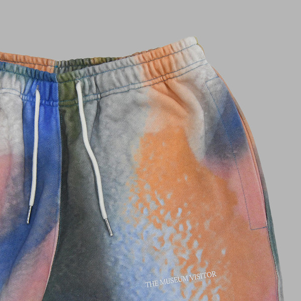 ◆THE MUSEUM VISITOR◆ SPRAYED PRINTED JOGGER PANTS MULTI 08 SPRAYED PRINTED JOGGER PANTS (MULTI) : THE MUSEUM VISITOR