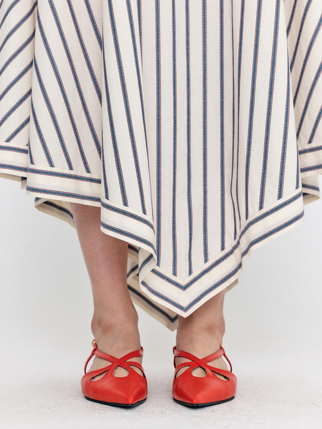 wolika-asymmetric-hem-skirt-cream-stripe-eenk