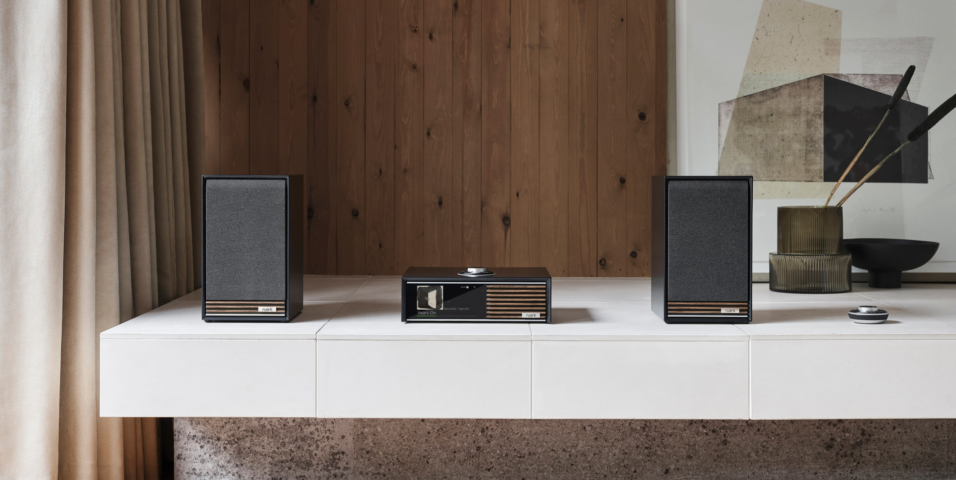 ‘Evoking the stereo music centres of the 1970s the R610<br>streaming amplifier & Sabre-R Bookshelf Speakers bring<br>amazing sound and timeless style to any interior space’