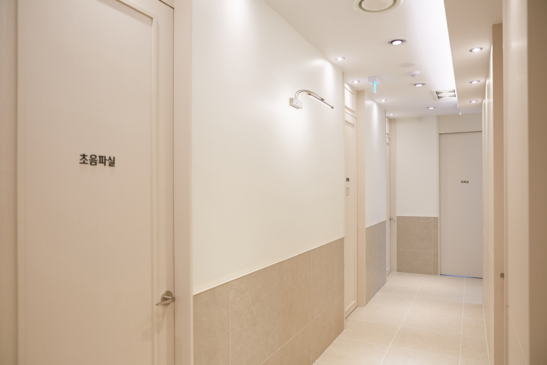 Private treatment room corridor at Eunice Women Clinic