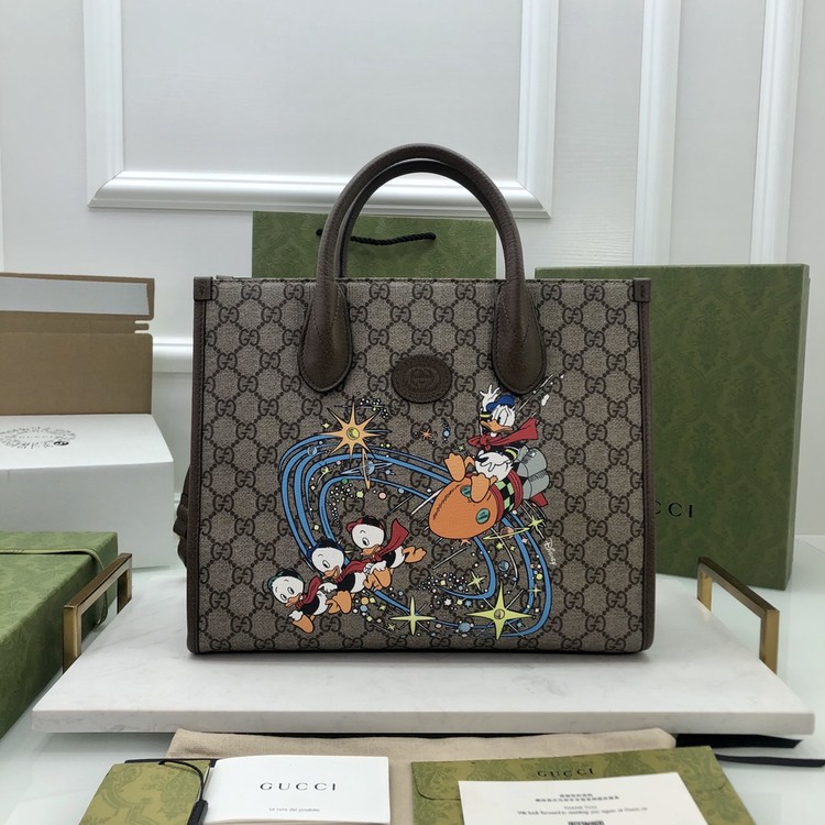 구찌 수프림 캔버스 디즈니 토트백 648134