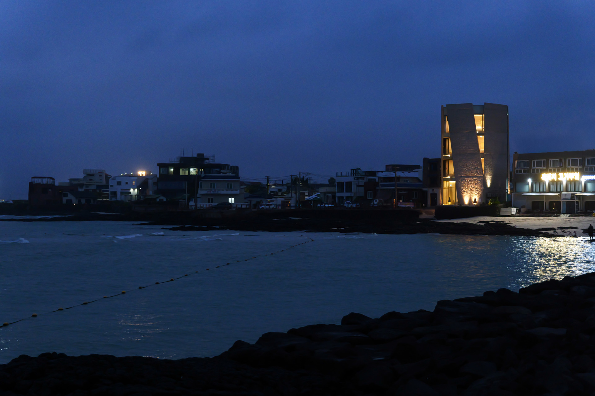 A bougie hotel on the beach at night