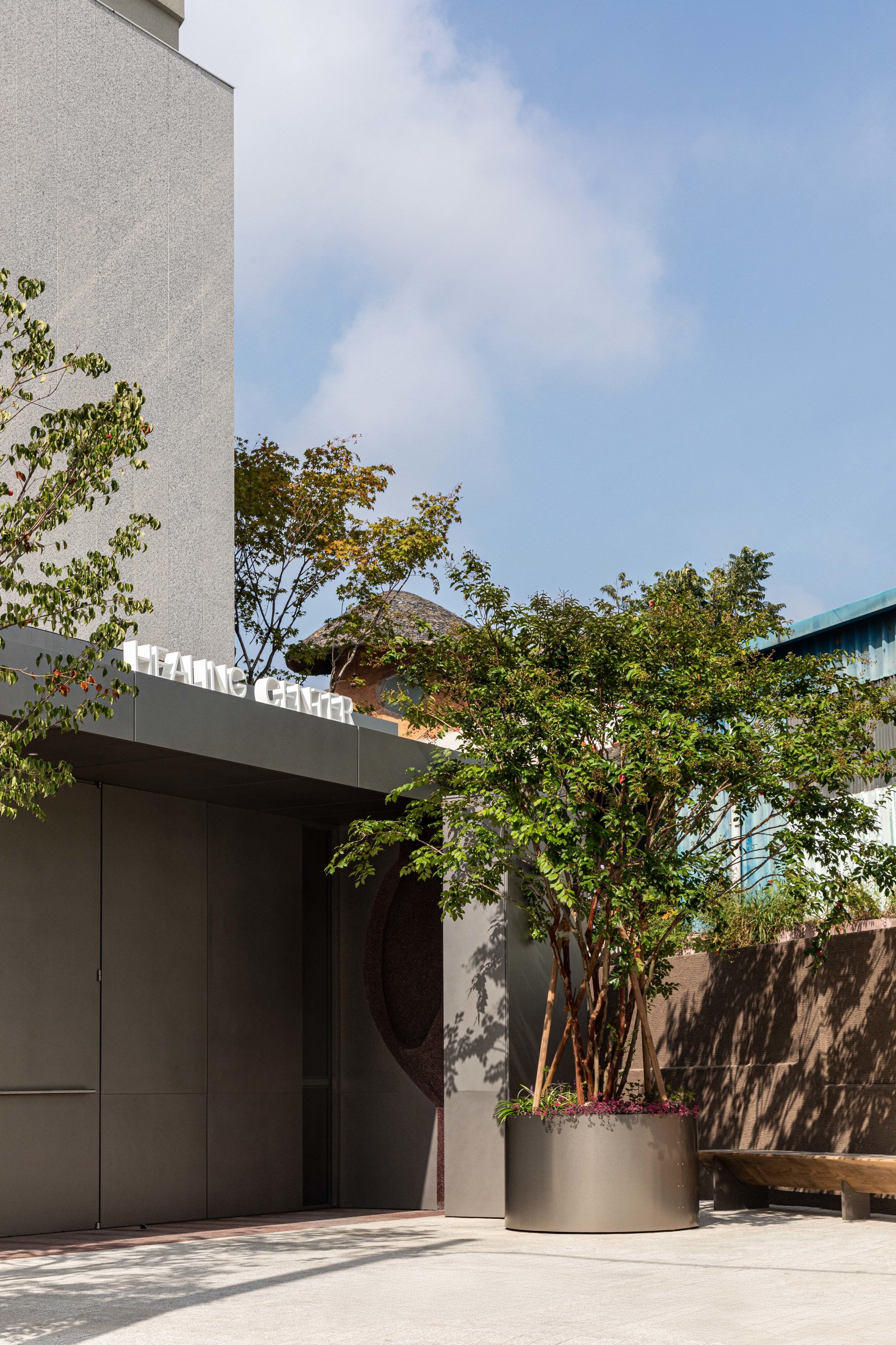 #04 Healing Center Exterior - Daytime View