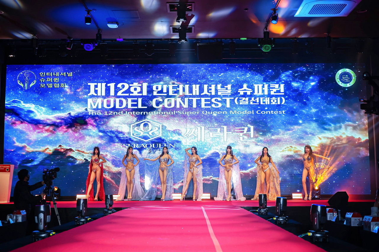 <div style="padding: 1em;"><p style="line-height: 1.1;"><strong><span style="color: rgb(255, 255, 255); font-size: 30px; letter-spacing: -1px;">2026 인터내셔널 슈퍼퀸<br>비키니 모델 콘테스트</span></strong></p><div style="         display: inline-block;         background-color: #f0b400;         color: white;         font-weight: bold;         font-size: 14px;         padding: 8px 16px;         border-radius: 8px;         cursor: pointer;         text-align: center;         box-shadow: 2px 2px 5px rgba(0, 0, 0, 0.2);     ">         접수중     </div></div>