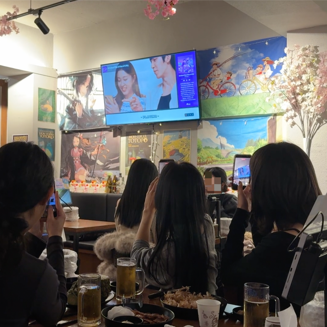 Hongdae bar screen playing music video