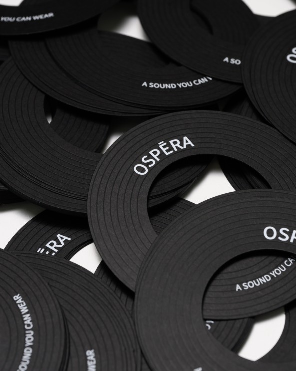 Founded on August 1, 2025, OSPÉRA is a Korean fashion accessories brand specializing in premium scarves and mufflers.  OSPÉRA was inspired by the timeless elegance of opera houses, where architectural beauty and artistic sound harmonize into a unified whole. Crafted from premium fabrics sourced from Italy and Japan, each piece guarantees exceptional quality, comfort, and artistic value.  Each product embodies the brand philosophy, “A Sound You Can Wear,” and is categorized into three lines: Art, Dot, and Daily. Drawing inspiration from the grand curves, symmetry, and intricate details of opera house architecture, OSPÉRA creates more than just scarves or mufflers—it offers wearable art pieces designed to leave a lasting impression