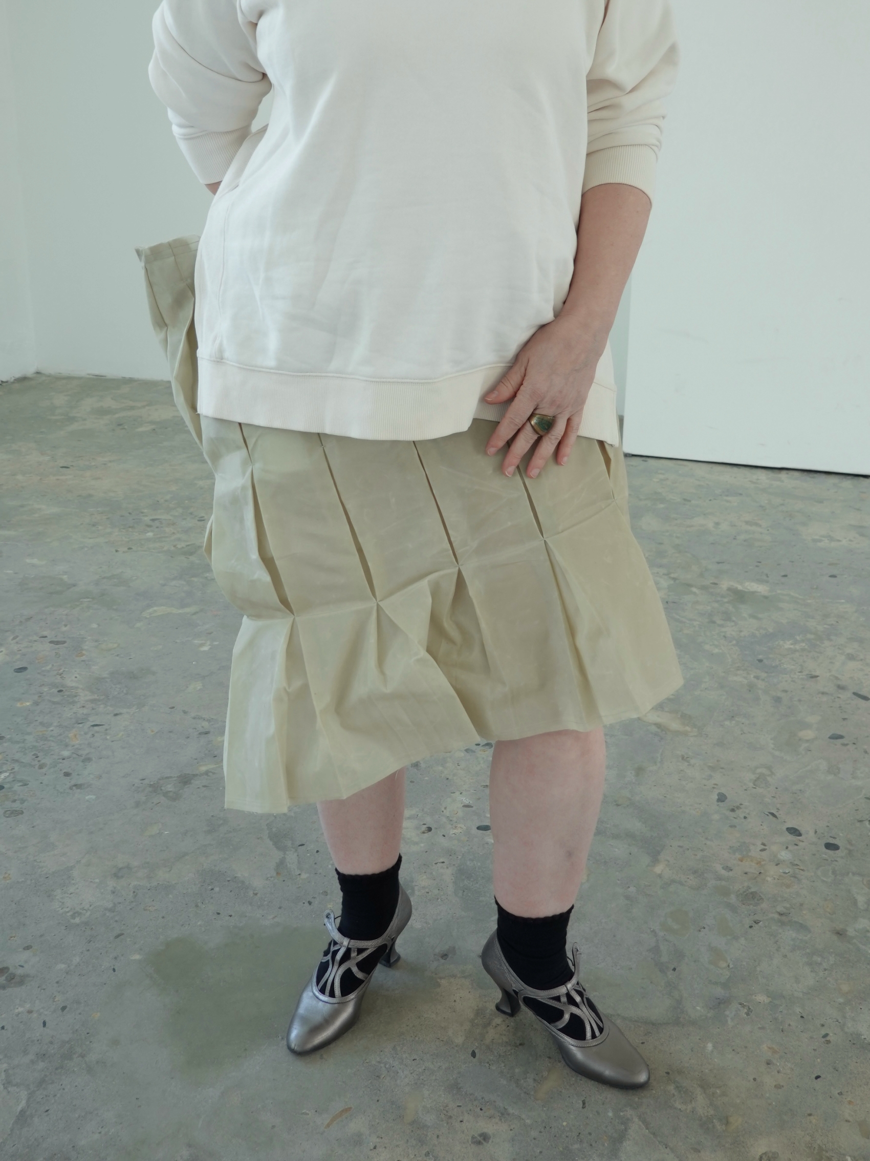 Harmony, three years into her daily routine, wear eont's the STTS skirt. 