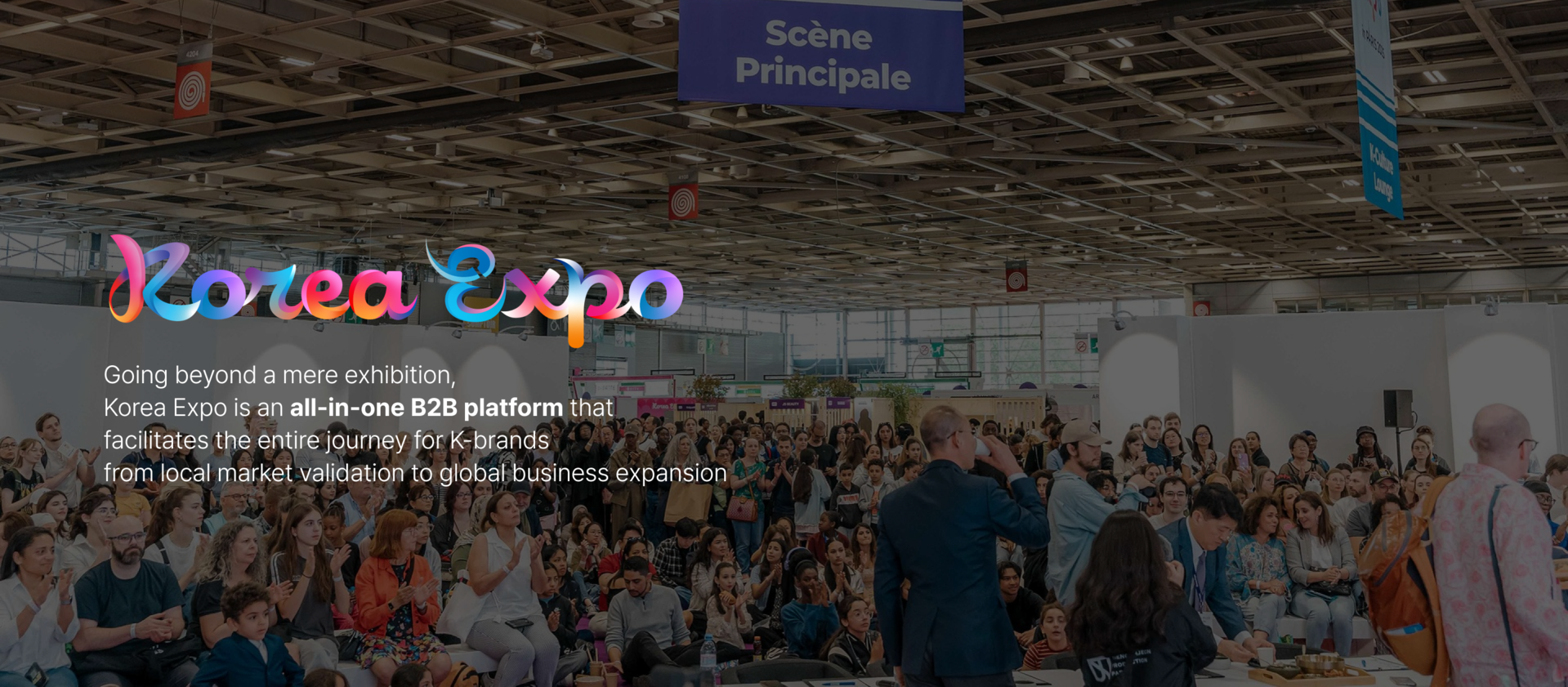 Korea Expo hero banner: audience gathered at the main stage in Paris venue with the “Korea Expo” logo 