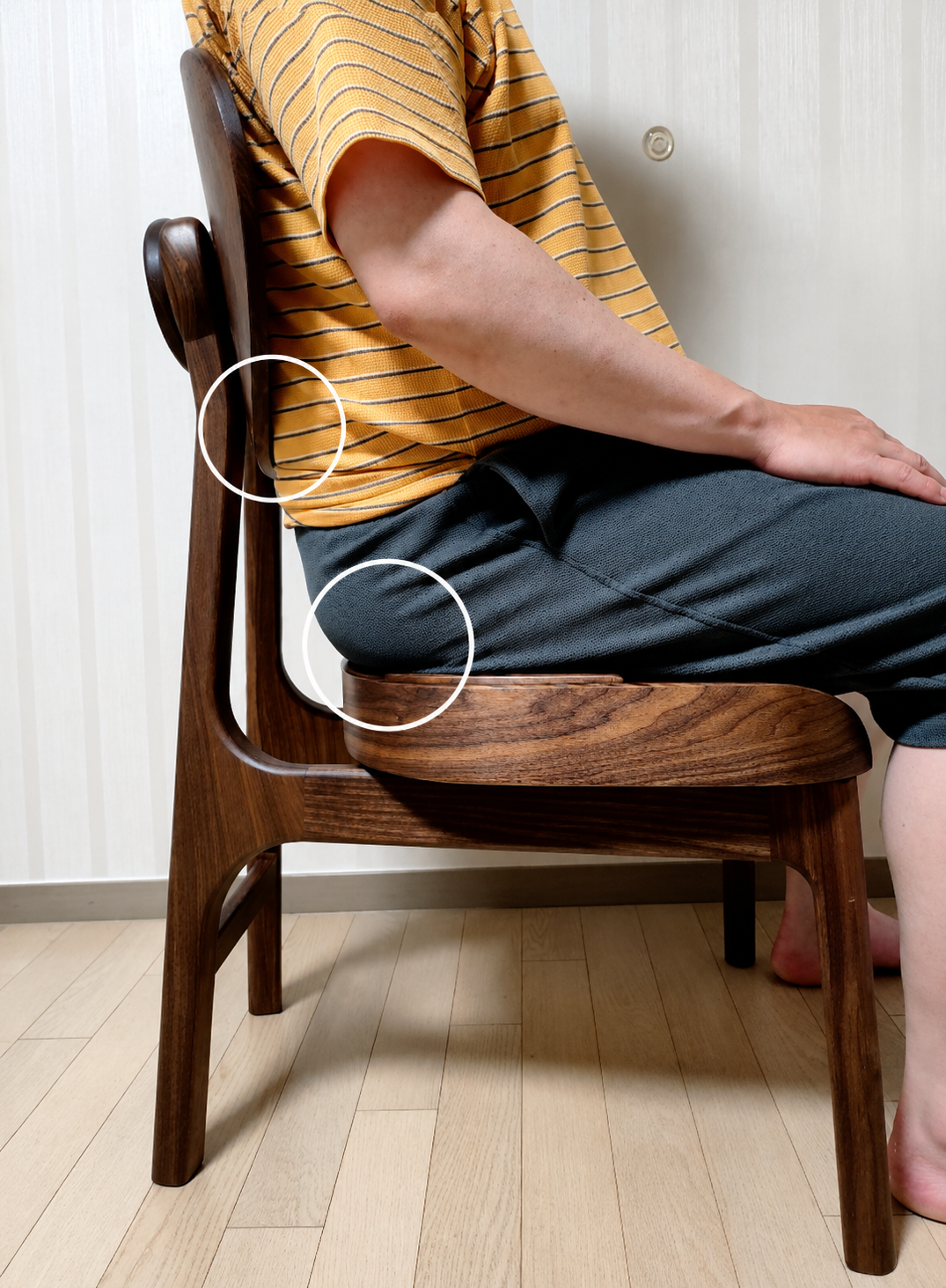 Kim using a NOOGI chair