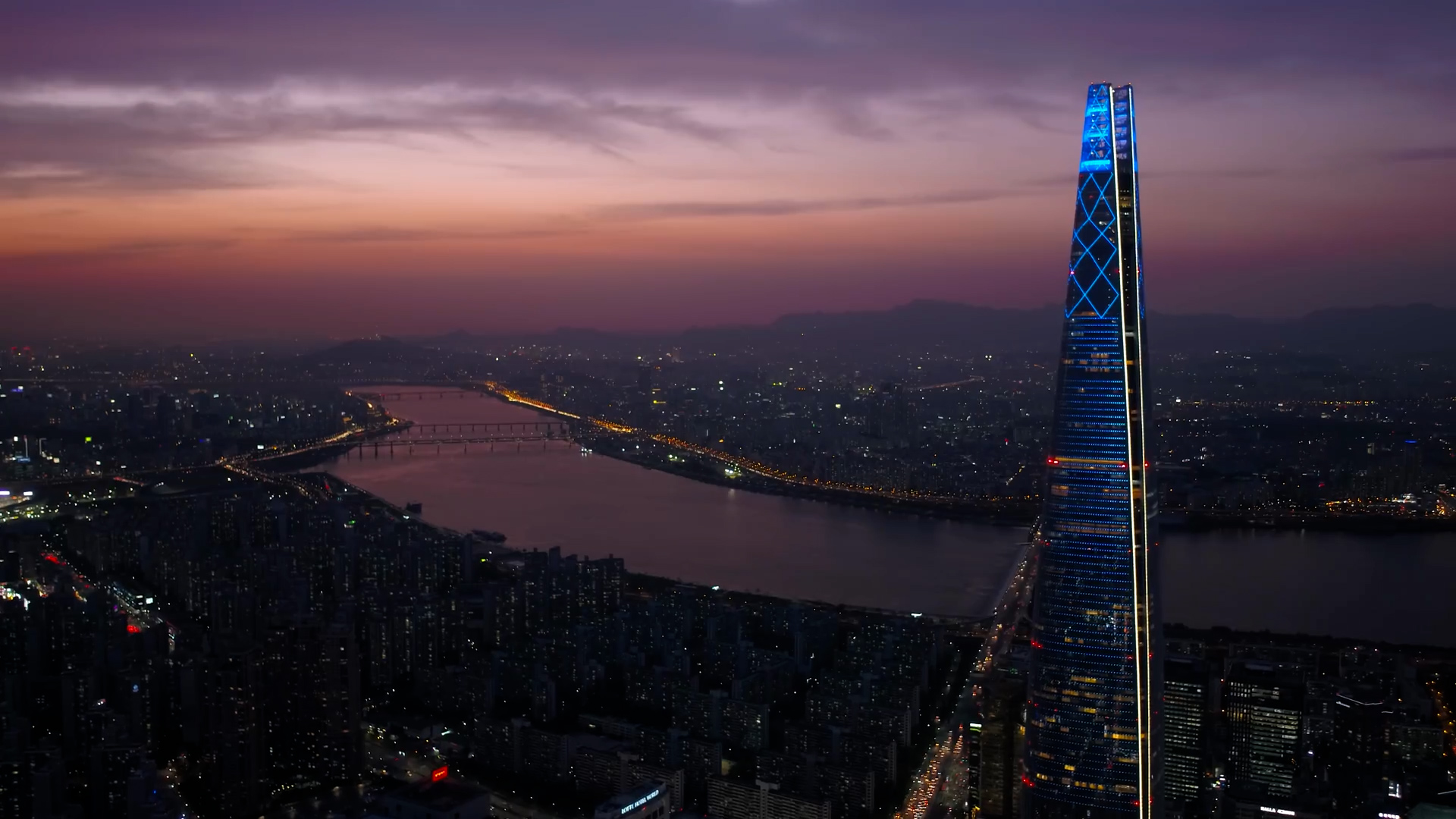 Seoul at dusk, the Han River and Lotte World Tower