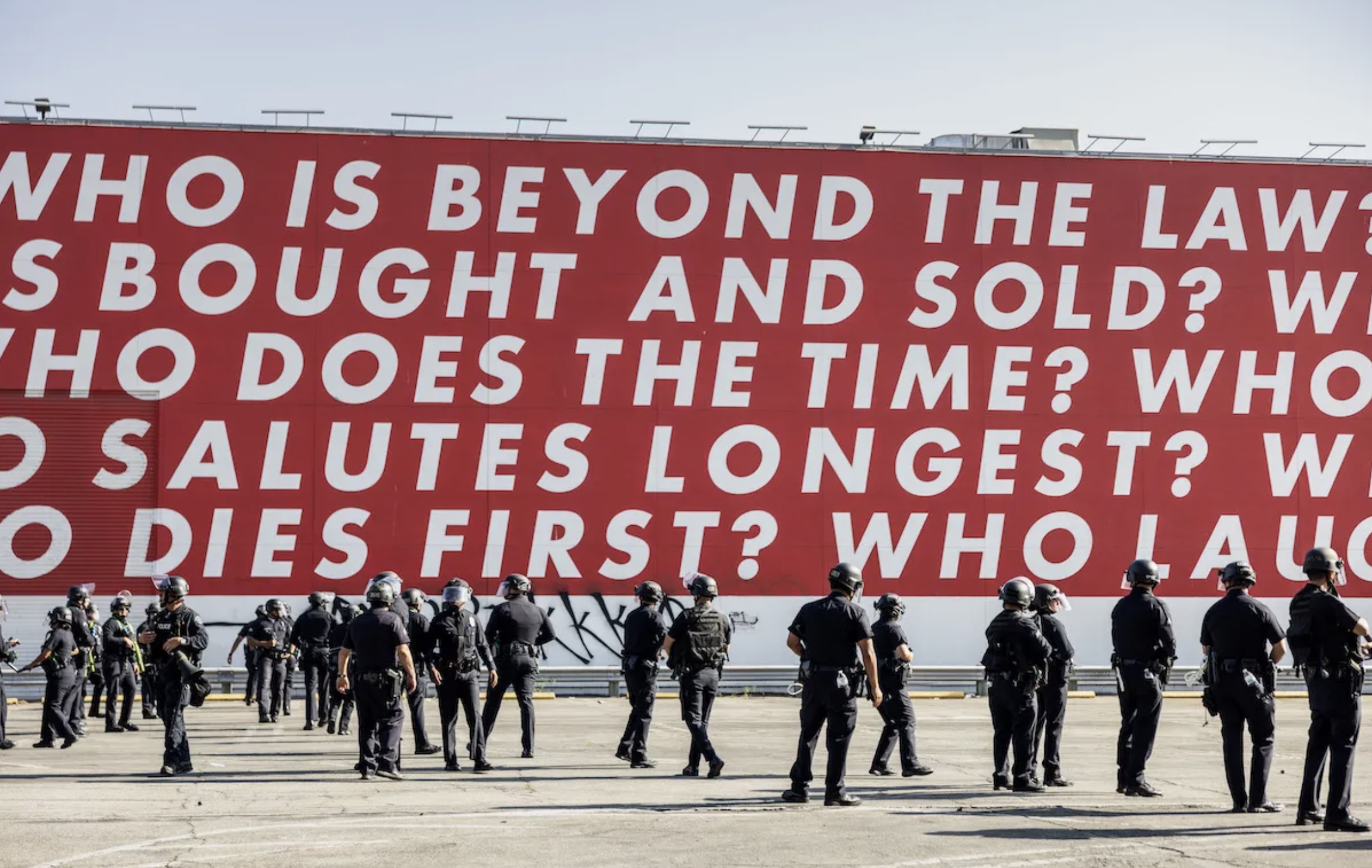 National Guard troops beneath Barbara Kruger's Untitled (Questions), 1990/2018, at the Museum of Contemporary Art Los Angeles this past weekend. Photo Jay L Clendenin/Getty Images