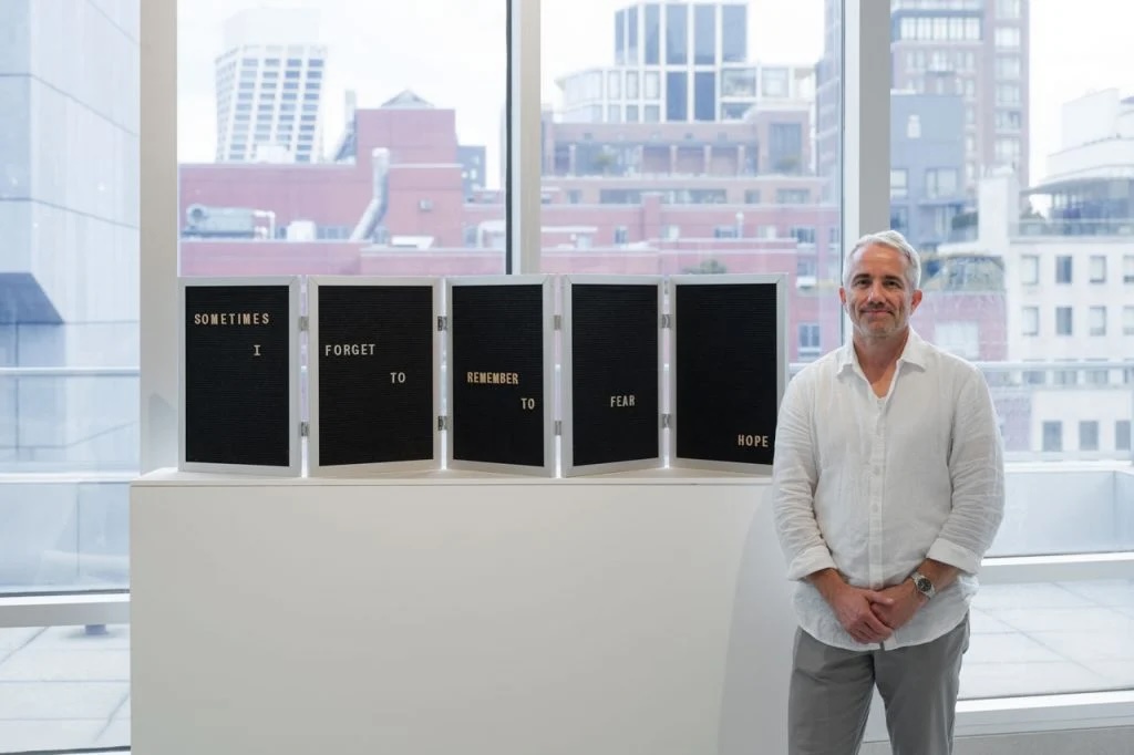 Zero Art fair co-founder William Powhida with an artwork by co-founder Jennifer Dalton. Photo: Steven Probert. Courtesy Zero Art Fair.