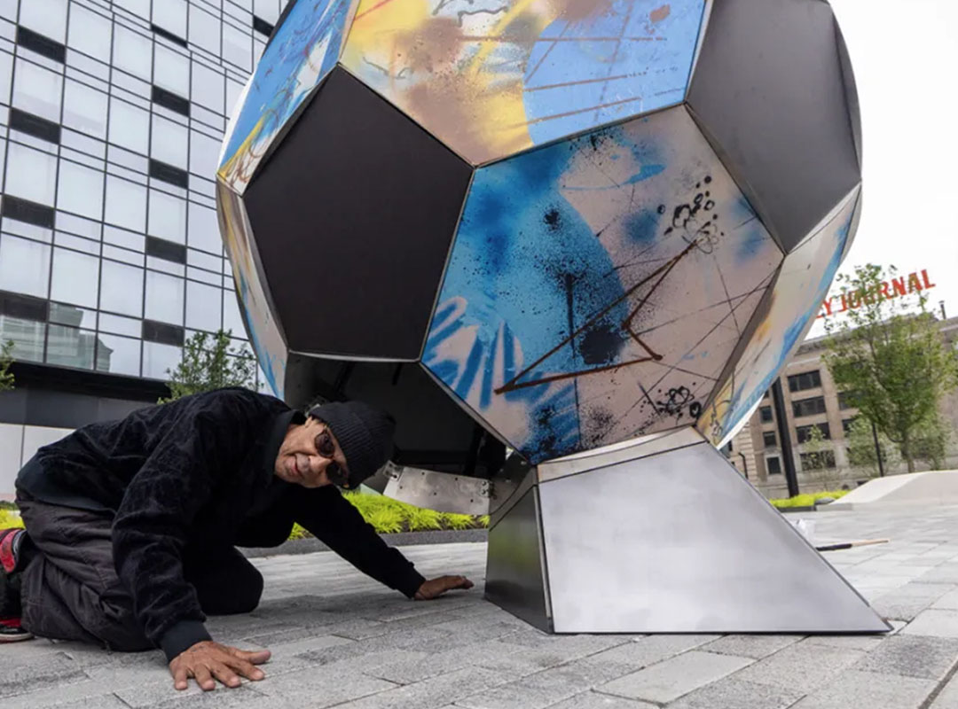 Futura 2000 with his soccer ball installed at Journal Square Plaza in Jersey City, New Jersey. Photo Jennifer Brown/City of Jersey City