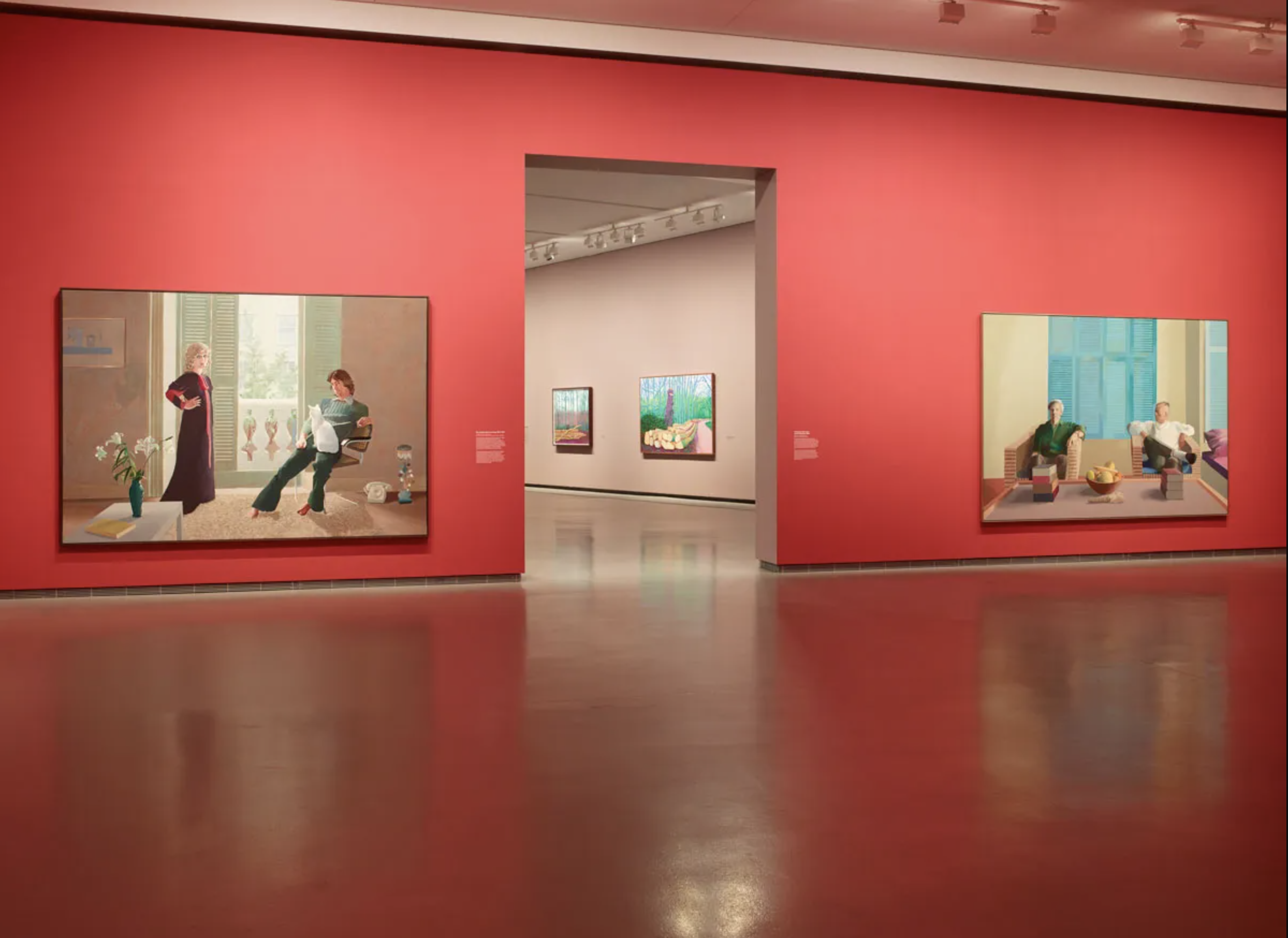 Installation view of “David Hockney 25,” 2025, at Fondation Louis Vuitton, Paris, showing, from left, Mr and Mrs Clark and Percy (1970–71) and Christopher Isherwood and Don Bachardy (1968). Photo: Marc Domage/©Fondation Louis Vuitton; Art: ©David Hockney