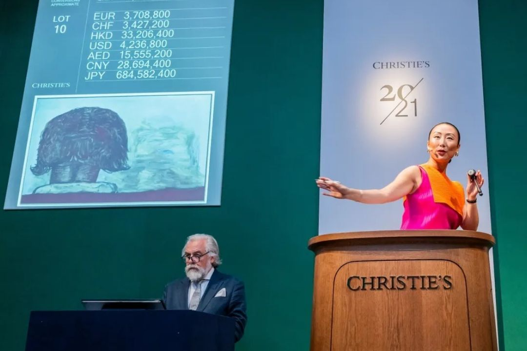 Auctioneer Yü-Ge Wang selling Philip Guston's Mirror Head at Christie's London. Guy Bell, Christie's Images Ltd. 2026