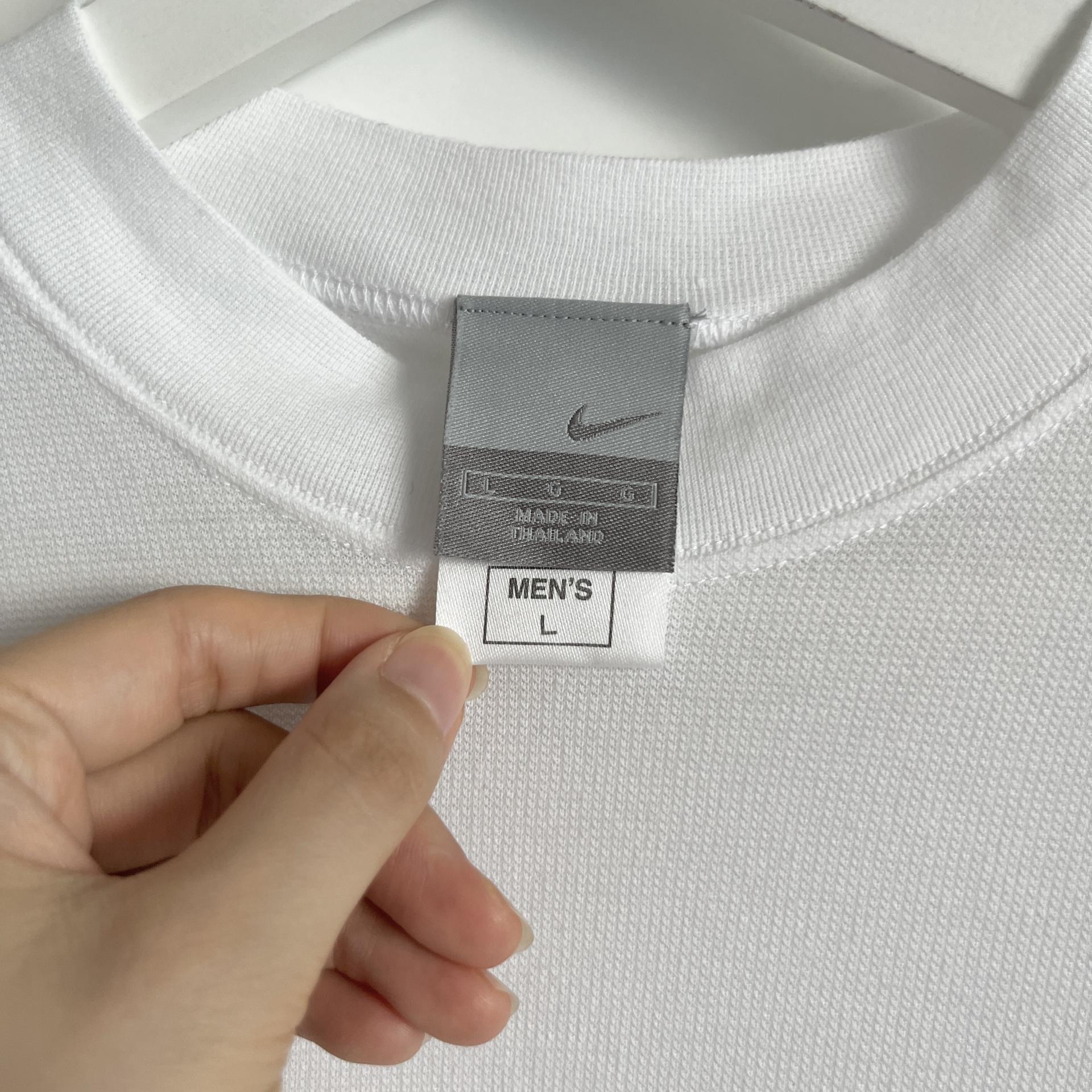 [ WOMAN ] NIKE Mini Swoosh T-Shirt