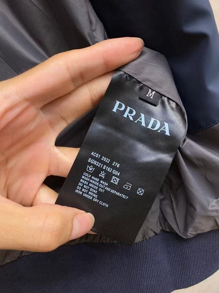 [국내배송] 프라* 26FW 리버시블 삼각로고 봄버자켓