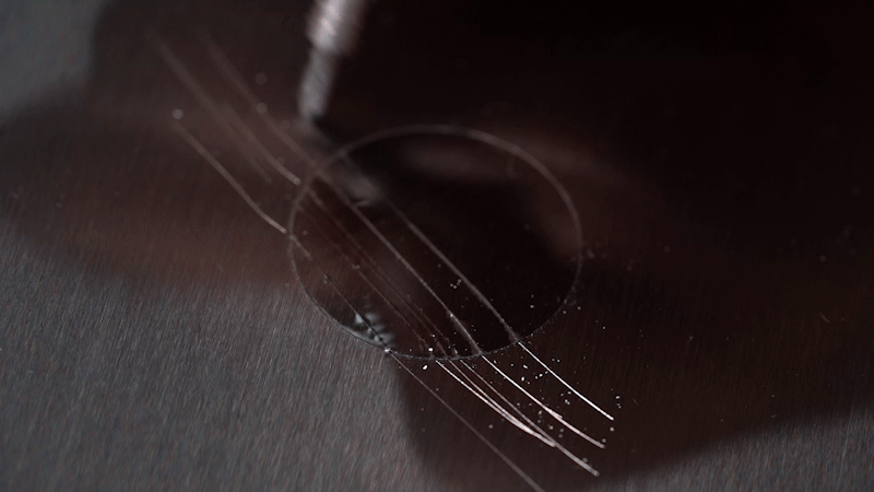scratching watchshells film on stainless steel