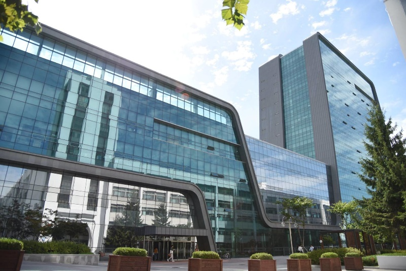 A low angle view of a building 
Description automatically generated