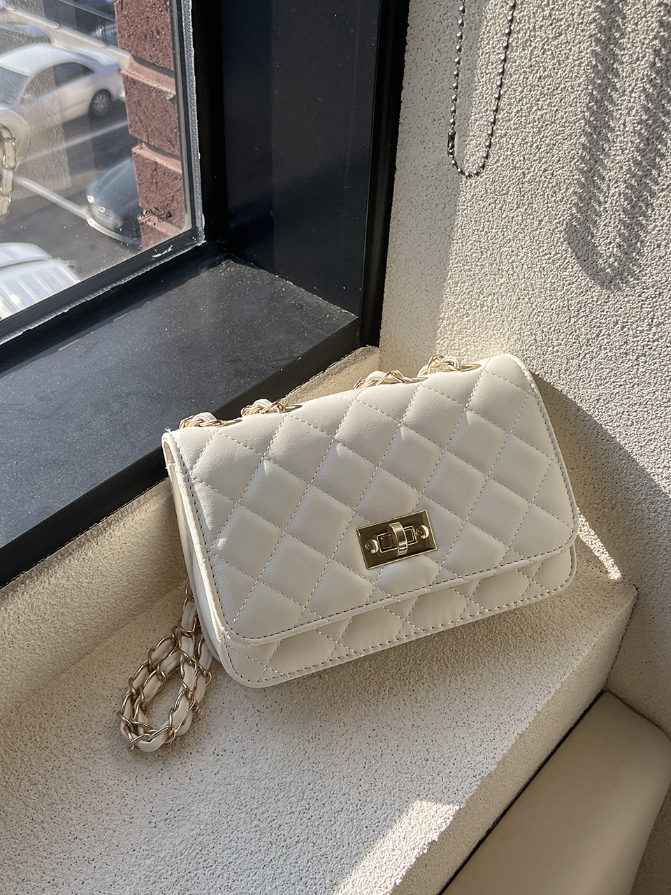 Classic buckle quilted mini chain shoulder bag