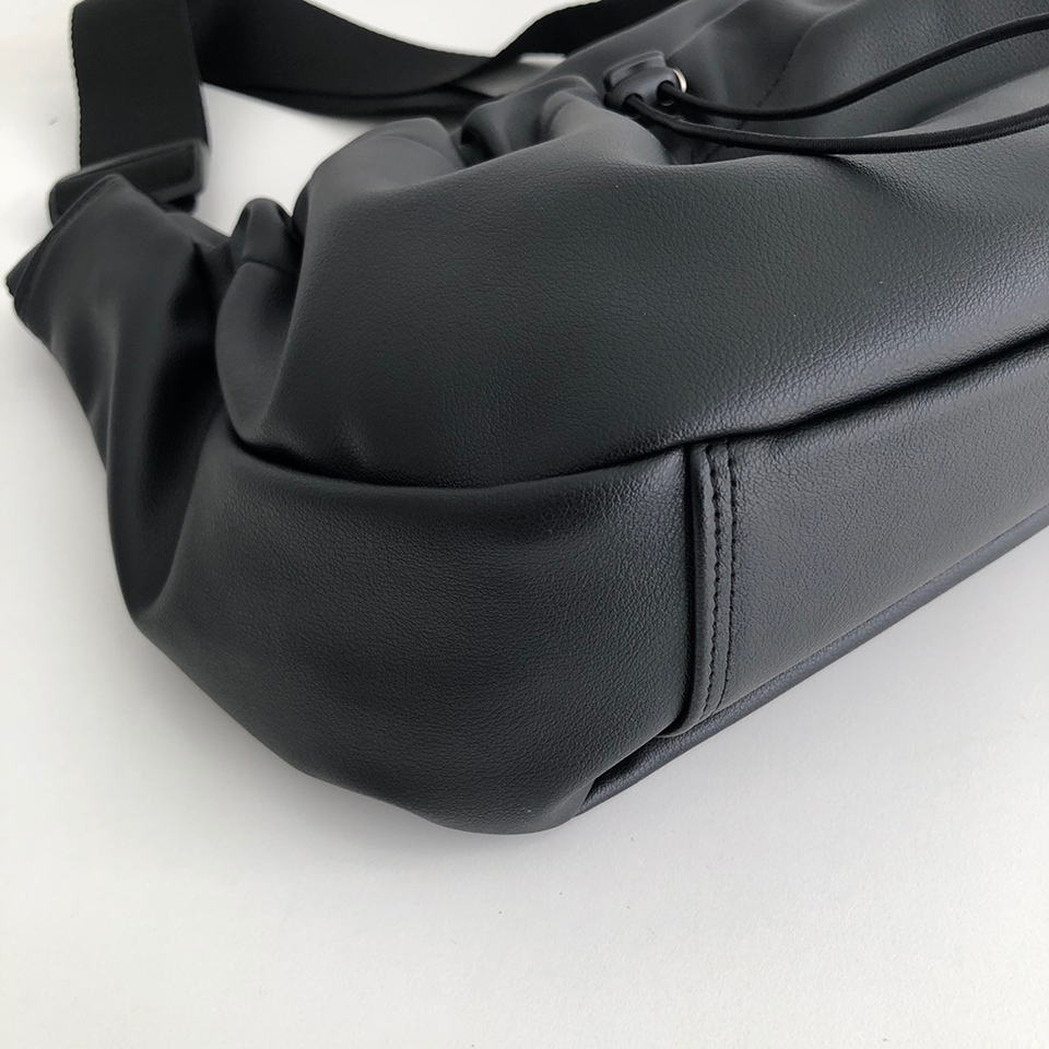 Leather String Pocket Zip-Up Crossbody Bag