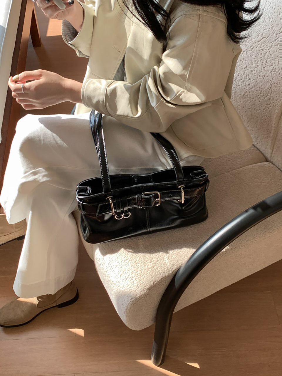 Belted glossy leather shoulder bag