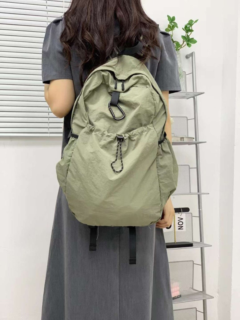 Nylon backpack with waist drawstring pockets