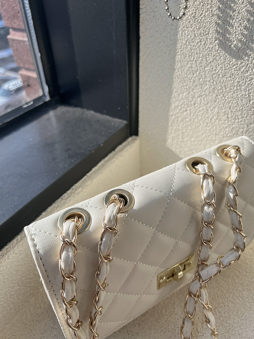Classic buckle quilted mini chain shoulder bag