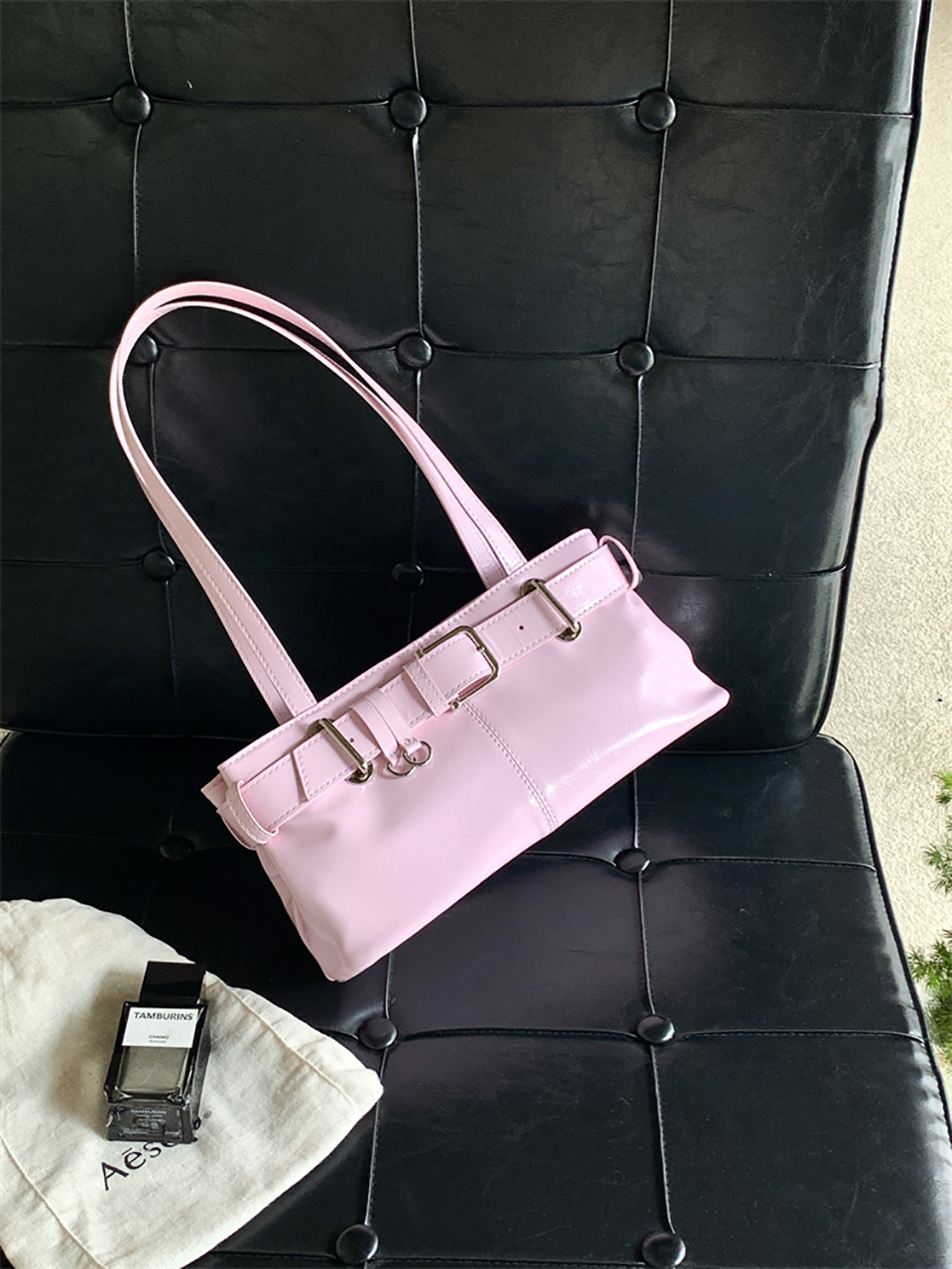 Belted glossy leather shoulder bag