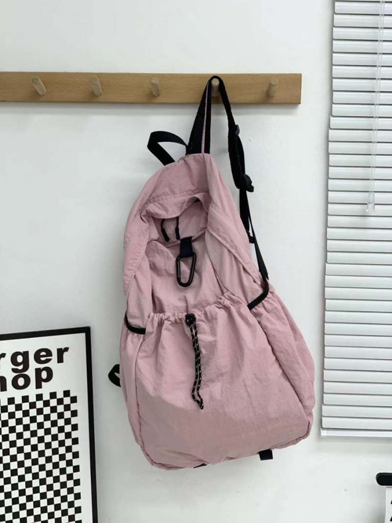 Nylon backpack with waist drawstring pockets