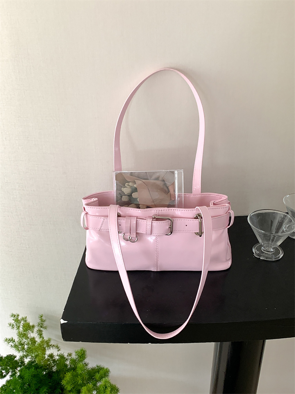 Belted glossy leather shoulder bag