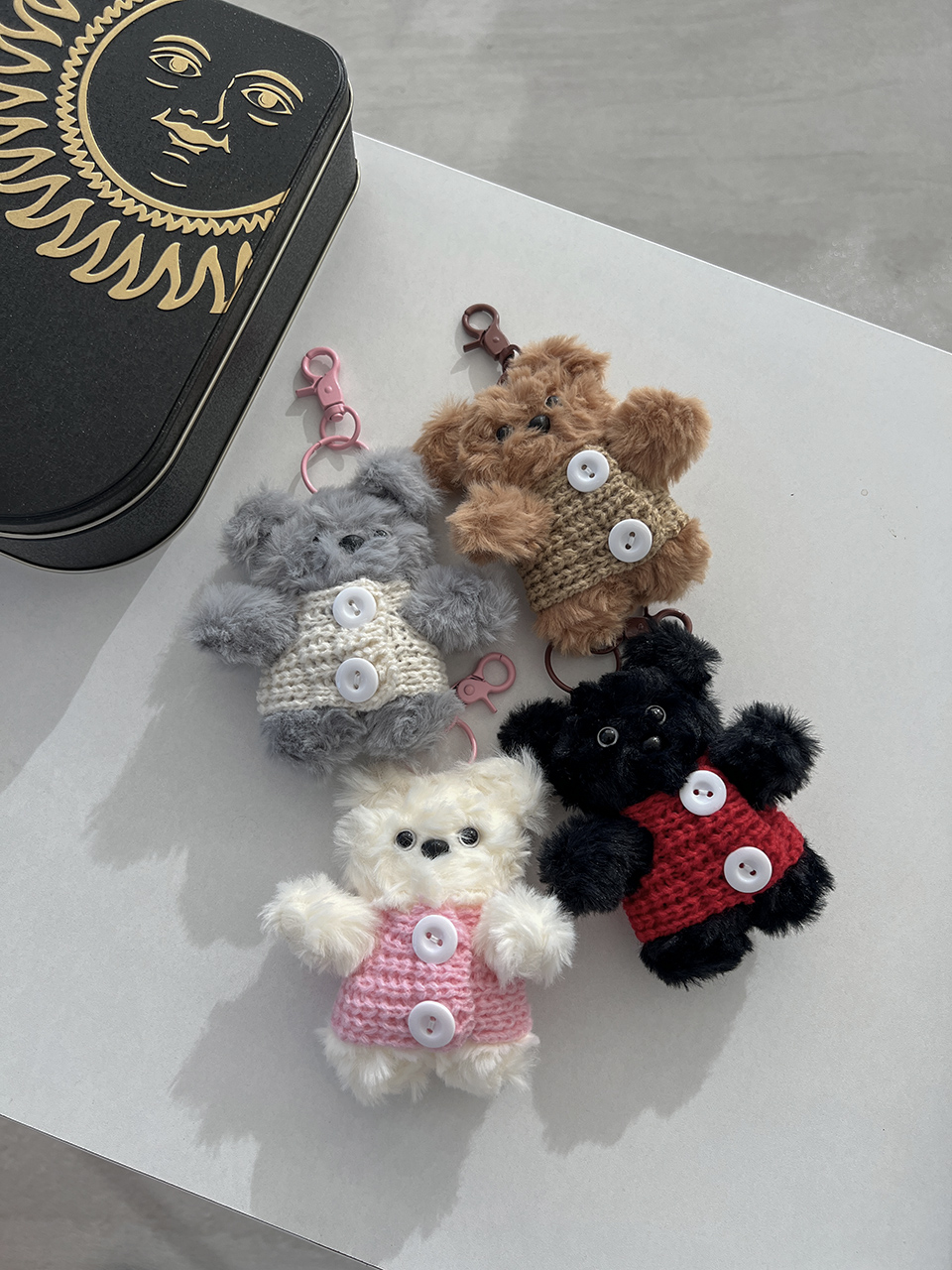 Knitted teddy bear button charm