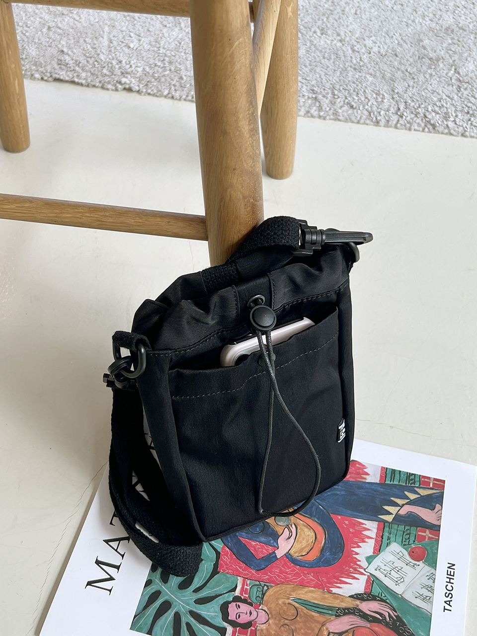 Roasted string mini crossbody bag