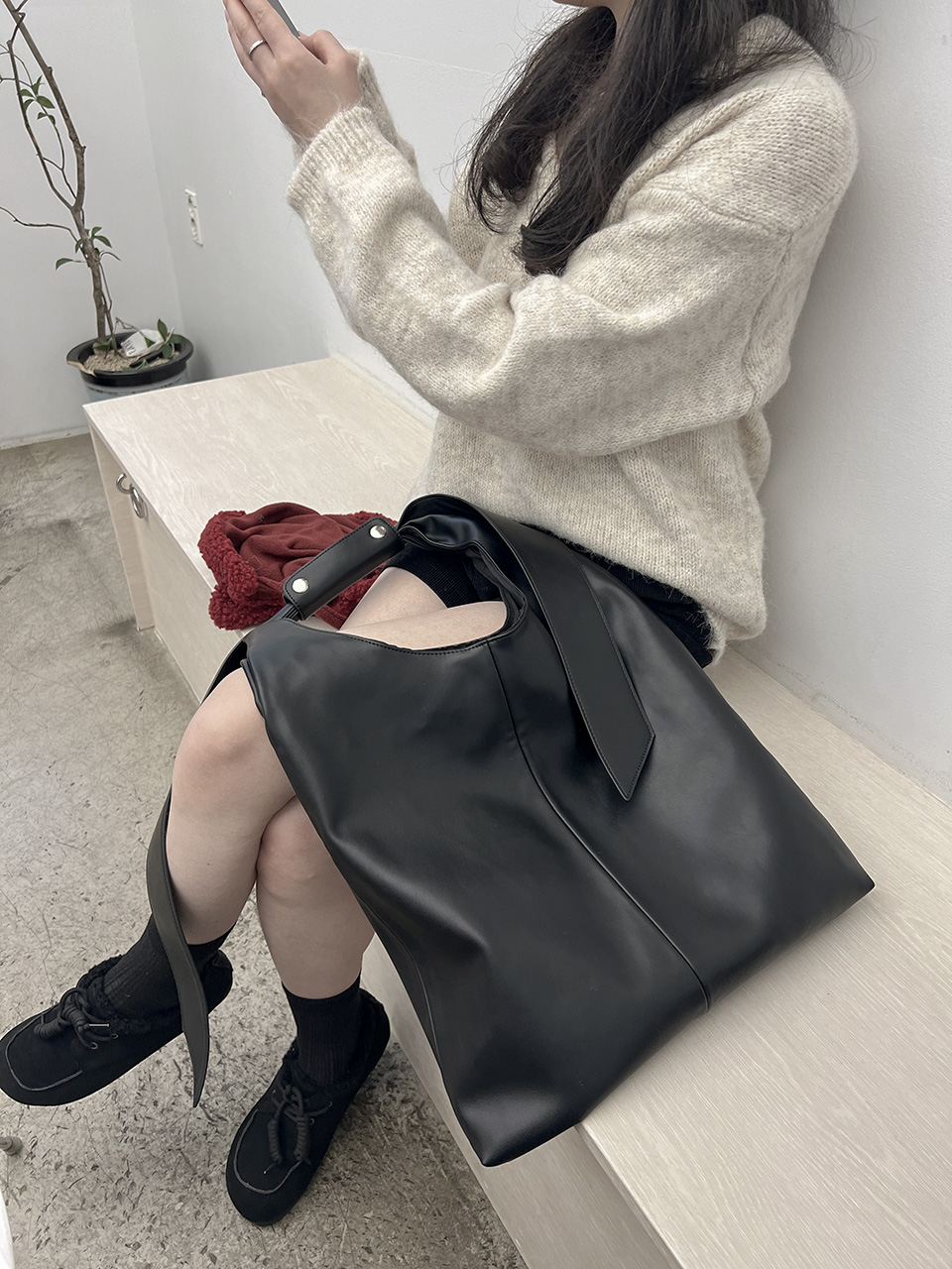 Leather snap shoulder bag