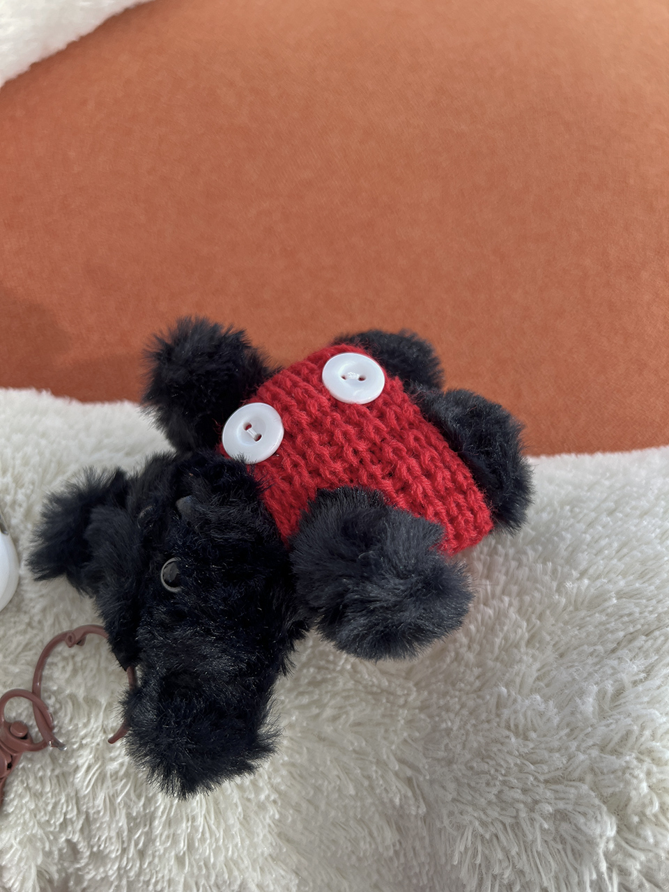 Knitted teddy bear button charm