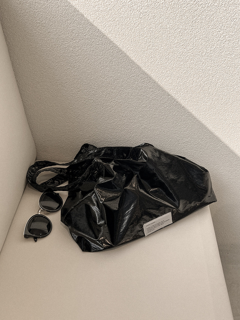Glossy nylon shoulder bag