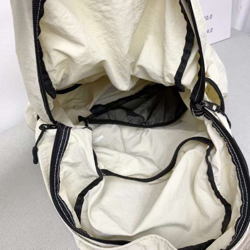 Nylon backpack with waist drawstring pockets