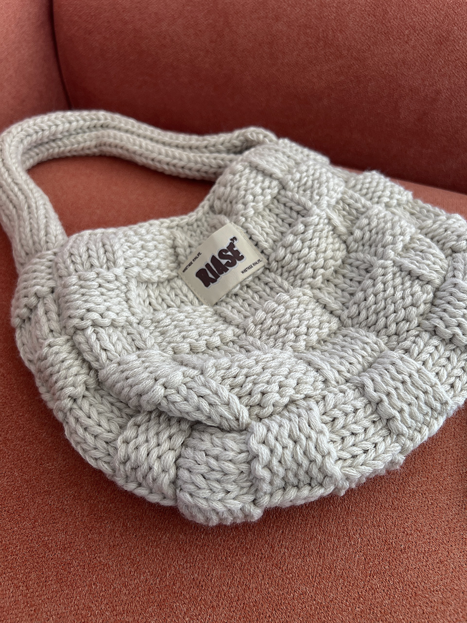 Knitted round crochet tote bag