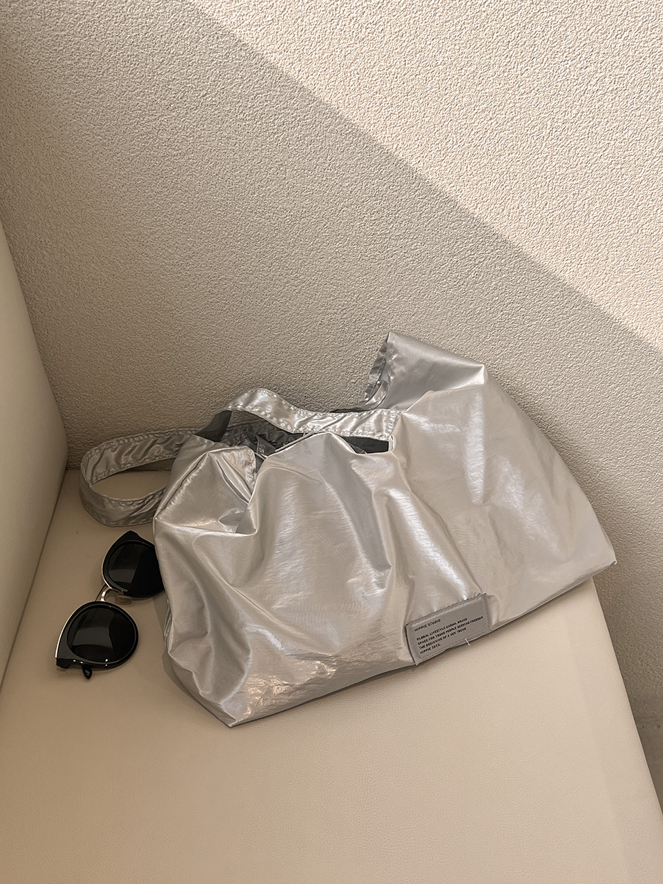 Glossy nylon shoulder bag