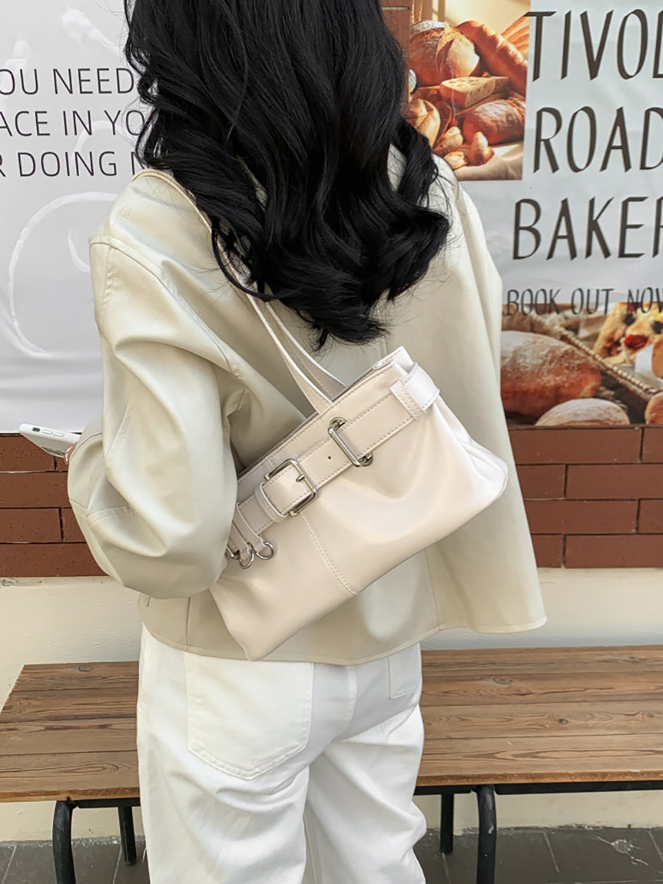 Belted glossy leather shoulder bag