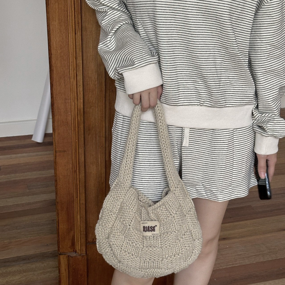 Knitted round crochet tote bag